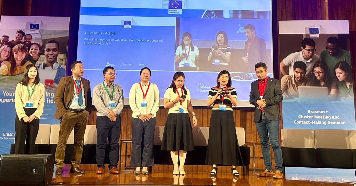 People making a presentation on a stage