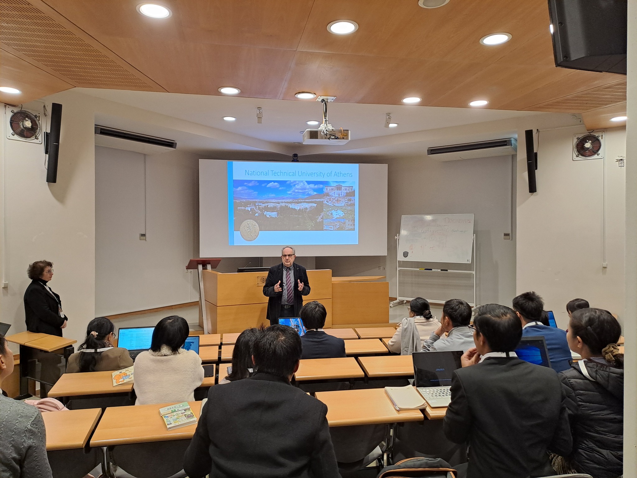 Professor speaking in an amphitheater