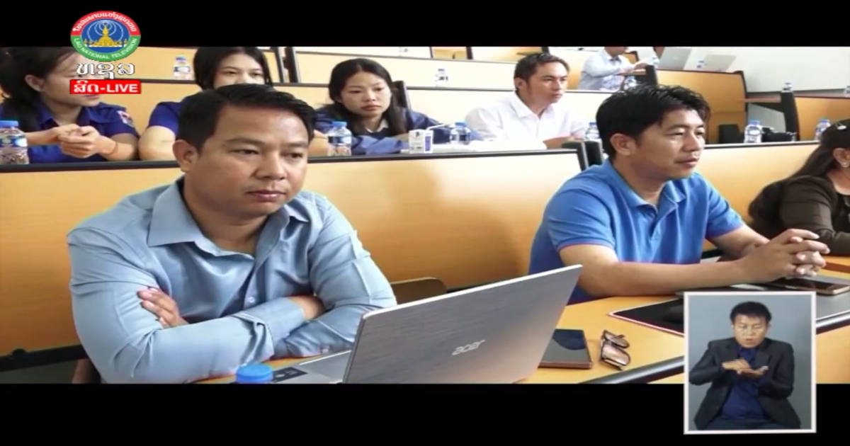 Video still of a TV news report showing a project event